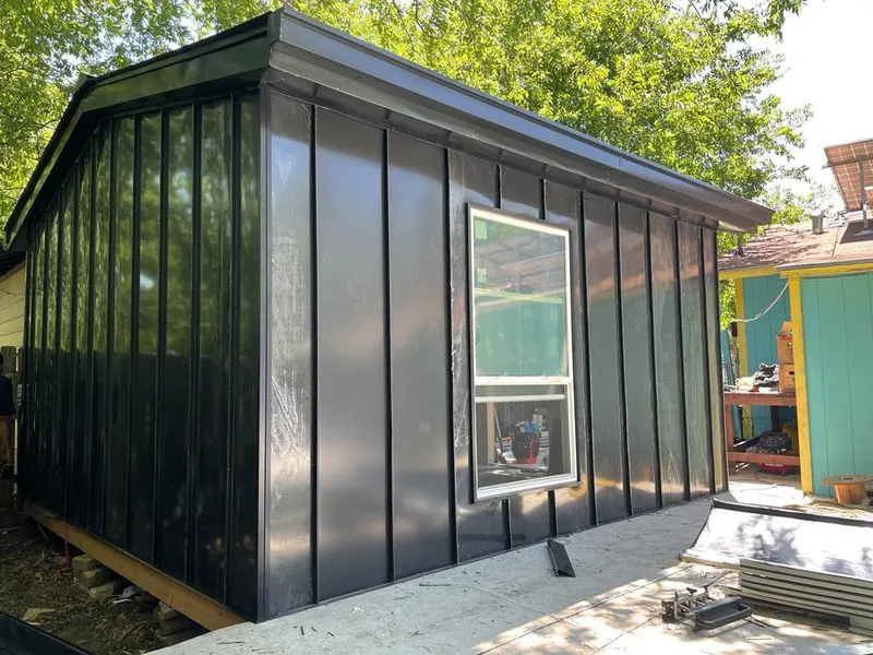 Black standing seam metal wall panels for Metal Roof Installation in Seneca